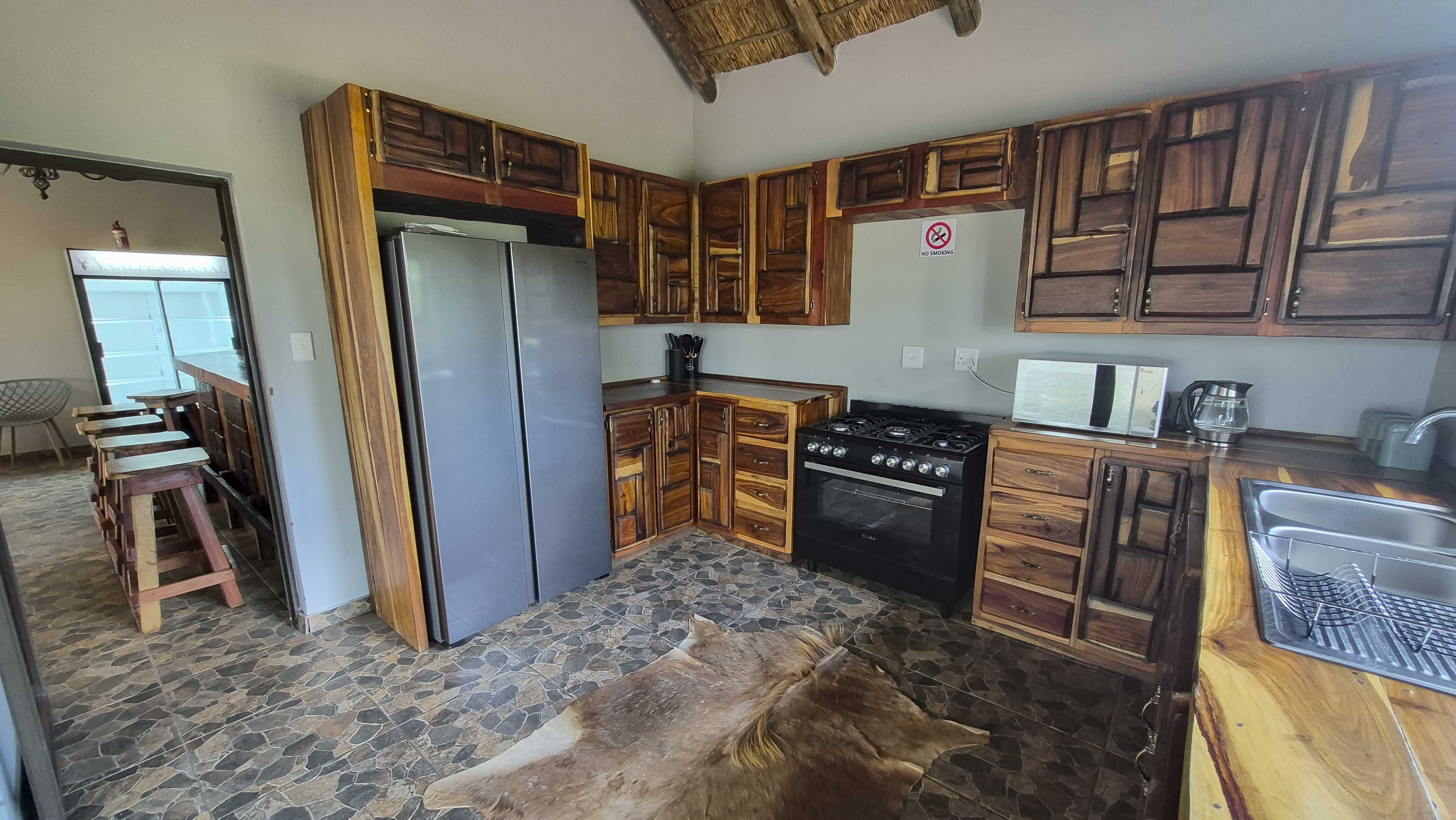 Kitchen with gas stove and electric oven